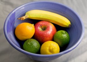 Fruit bowl showing several fruits together in a bowl.