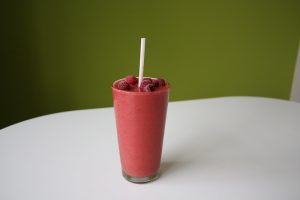 Blended fruit smoothie.