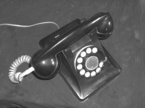 Black and white photograph of a rotary phone