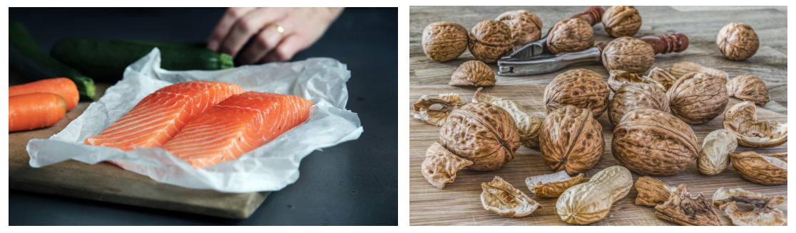Examples of foods high in polyunsaturated fats are shown. On the right is a photo of two raw salmon fillets and on the left is a wooden board with a variety of nuts still in their shell and a handheld nutcracker.