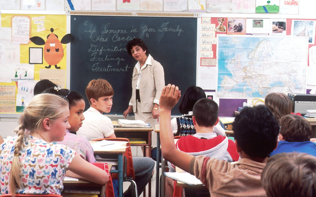 Middle school students with teacher